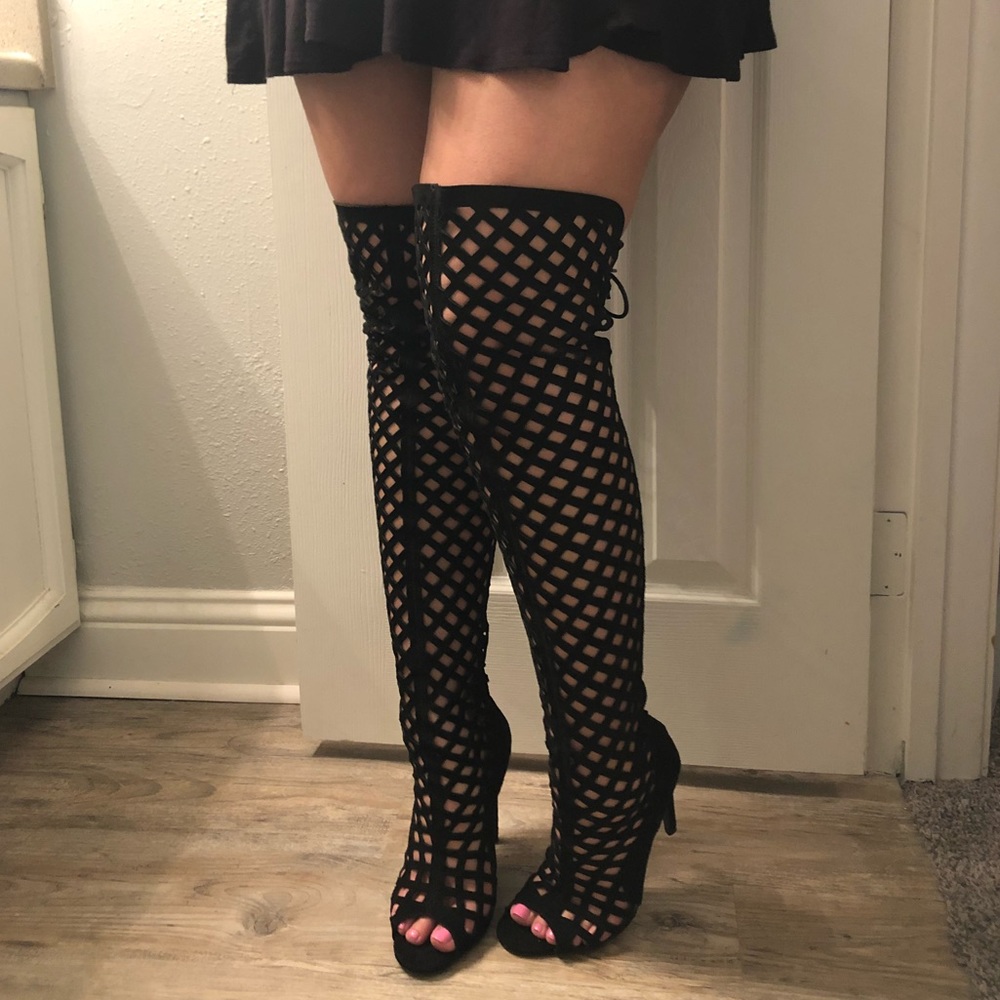 Thigh high net heels.